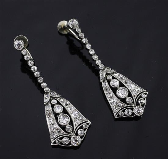A pair of Edwardian Belle Epoque white gold and platinum, diamond set bell shaped drop earrings, 1.5in.